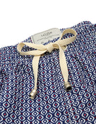 Traje de baño geom. boomerang Azul/rojo